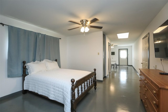 bedroom with concrete floors and ceiling fan