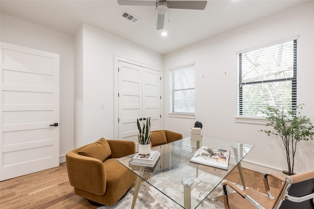 office area featuring recessed lighting, visible vents, light wood finished floors, and ceiling fan