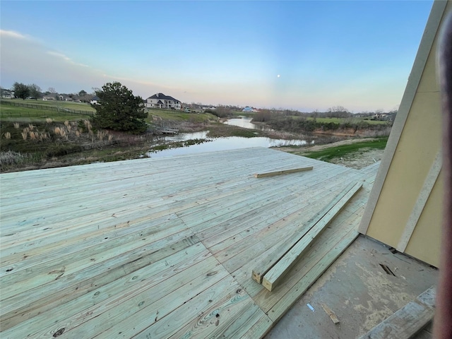 deck featuring a water view