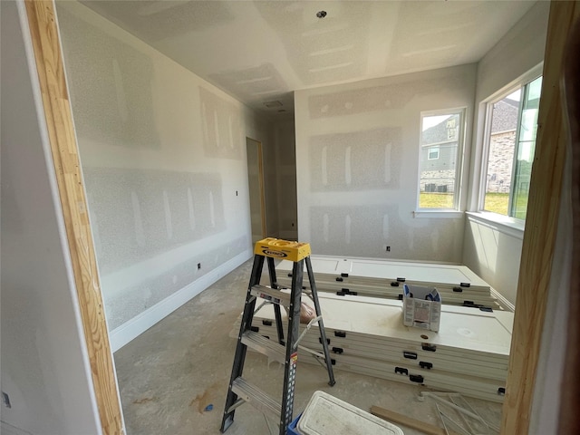 299 Peninsula Point Dr, Montgomery, TX 77356 - bathroom with concrete floors and baseboards