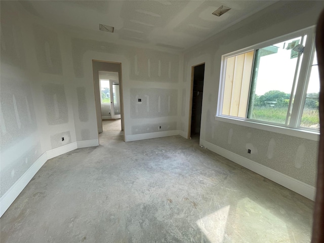 299 Peninsula Point Dr, Montgomery, TX 77356 - unfurnished bedroom featuring concrete flooring and baseboards
