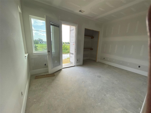 299 Peninsula Point Dr, Montgomery, TX 77356 - interior space featuring concrete floors and baseboards