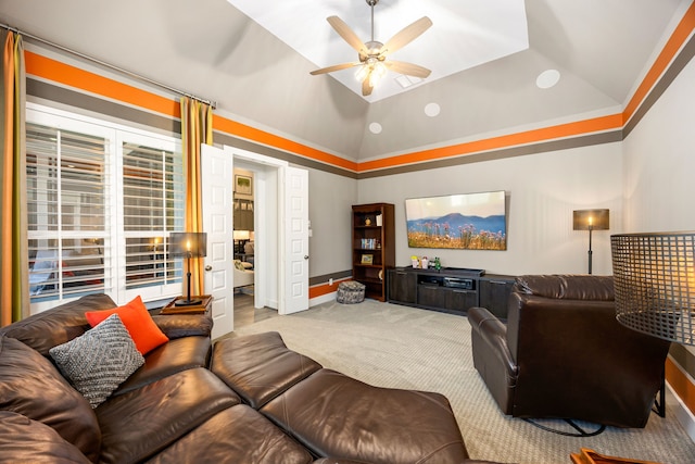 living area featuring vaulted ceiling, baseboards, carpet floors, and ceiling fan