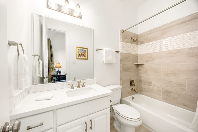 full bath with vanity, toilet, and bathtub / shower combination