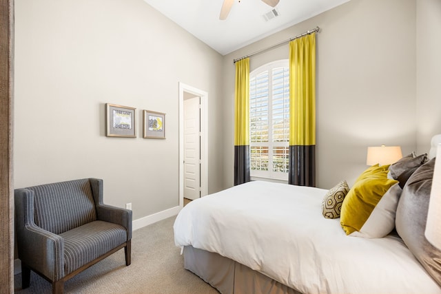 carpeted bedroom with visible vents, ceiling fan, and baseboards