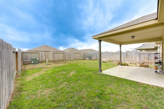 view of yard featuring a patio area and a fenced backyard