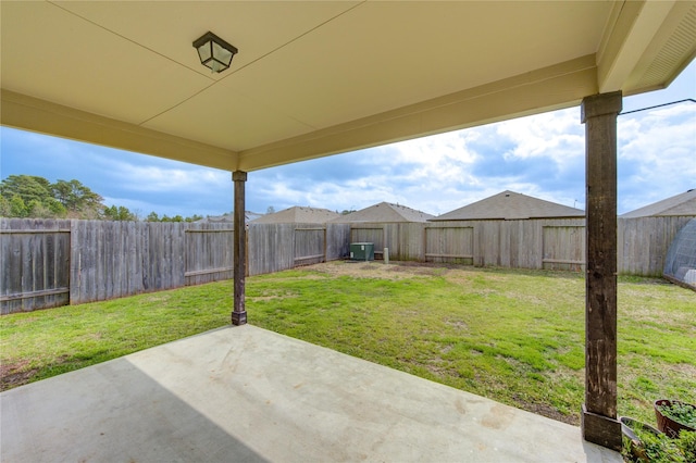 view of yard featuring a patio and a fenced backyard