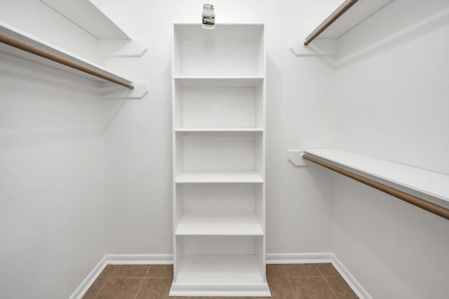 walk in closet featuring tile patterned floors