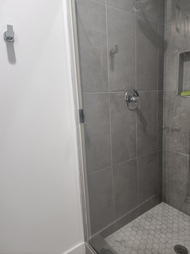 bathroom with a stall shower