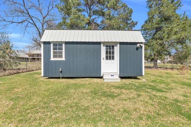 view of shed featuring a fenced backyard