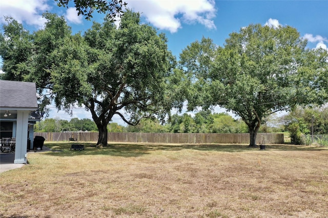 view of yard featuring fence