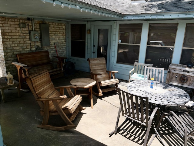 view of patio featuring outdoor dining area