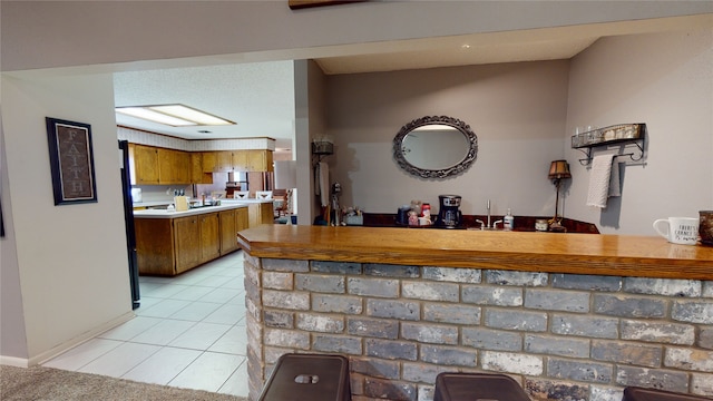 bar with light tile patterned floors