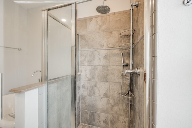 full bathroom with a shower stall