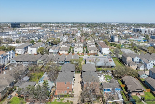 birds eye view of property with a residential view