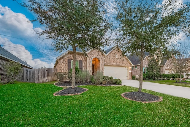 view of front of house with brick siding, a front lawn, fence, concrete driveway, and an attached garage