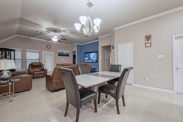 dining space with light tile patterned floors, baseboards, visible vents, crown molding, and ceiling fan with notable chandelier