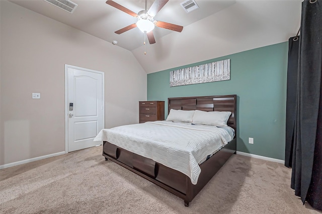 carpeted bedroom with visible vents, lofted ceiling, baseboards, and ceiling fan