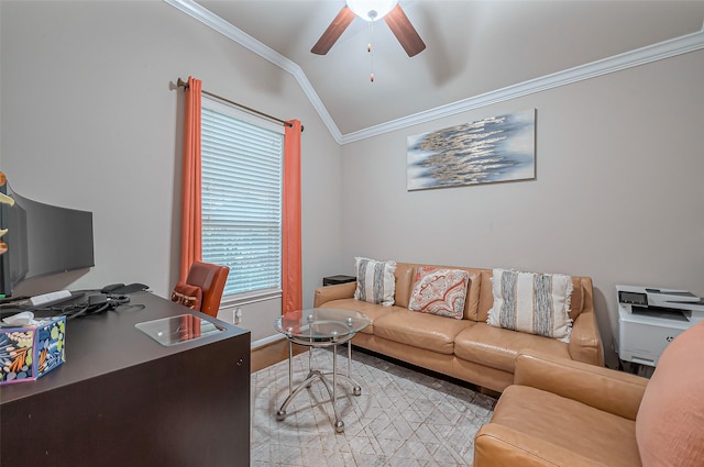 living room with baseboards, lofted ceiling, ornamental molding, light wood-style flooring, and a ceiling fan