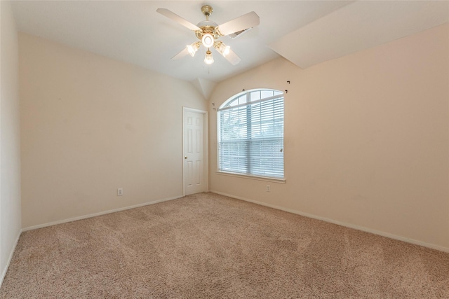 spare room featuring baseboards, carpet floors, and a ceiling fan