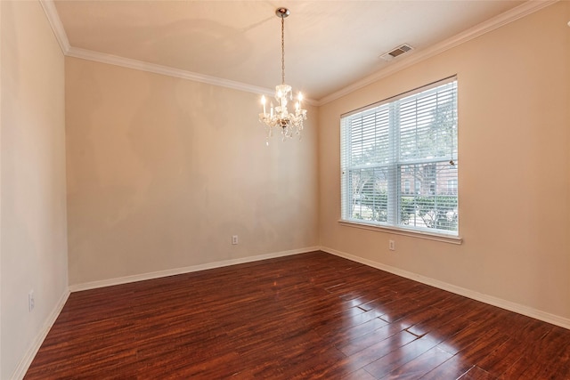 spare room featuring crown molding, baseboards, visible vents, and dark wood-style flooring