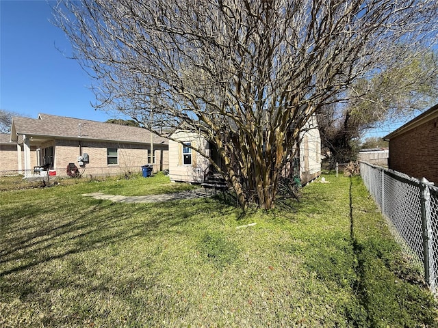 view of yard with fence