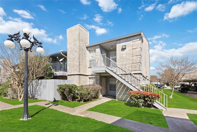 view of building exterior featuring stairs