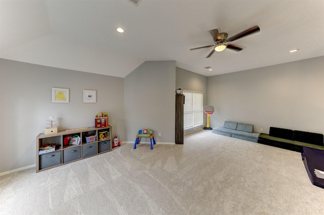 playroom featuring baseboards, lofted ceiling, a ceiling fan, and carpet flooring