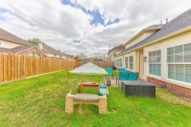 view of yard with a fenced backyard