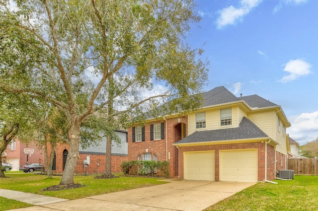 view of front facade featuring driveway, a front lawn, cooling unit, a shingled roof, and brick siding