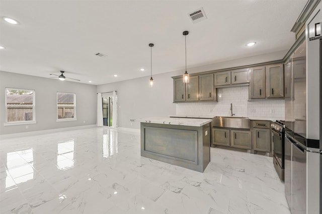 kitchen with a ceiling fan, visible vents, marble finish floor, a sink, and black gas stove
