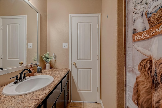 bathroom featuring vanity and tile patterned flooring