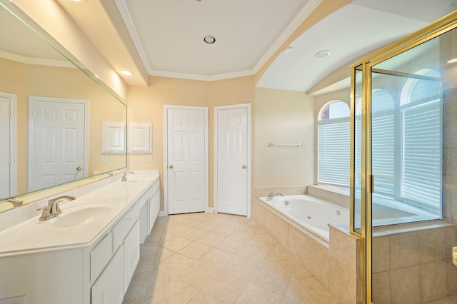 bathroom with crown molding, double vanity, a whirlpool tub, and a sink