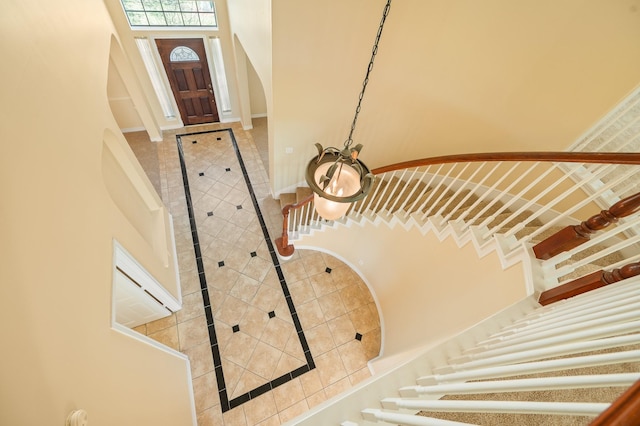 stairway with a high ceiling