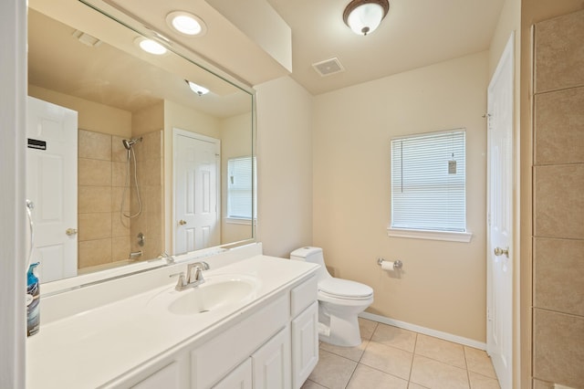 full bathroom featuring visible vents, toilet, tile patterned flooring, a shower, and vanity