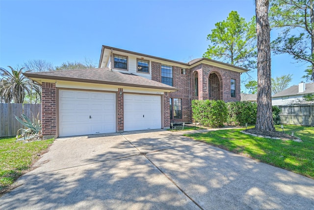 view of front of home featuring driveway, brick siding, a front lawn, and fence