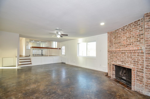 unfurnished living room featuring visible vents, a brick fireplace, finished concrete flooring, ceiling fan, and recessed lighting