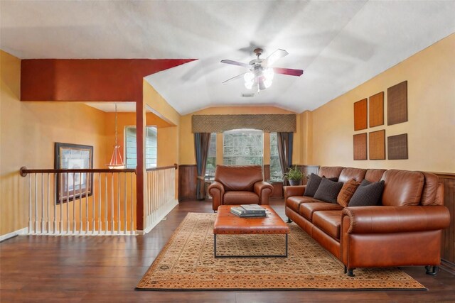 living area featuring ceiling fan, lofted ceiling, and wood finished floors