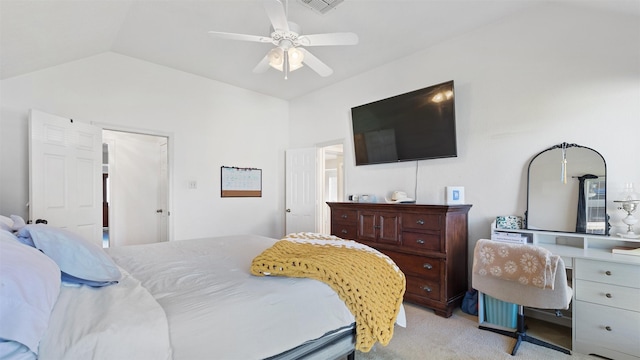 bedroom featuring lofted ceiling, light colored carpet, and ceiling fan