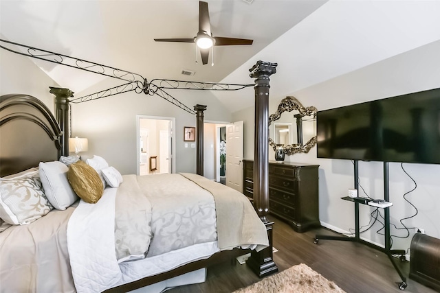 bedroom with a ceiling fan, visible vents, decorative columns, dark wood-style flooring, and vaulted ceiling