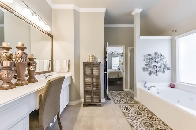 full bath featuring a wealth of natural light, a whirlpool tub, crown molding, tile patterned flooring, and vanity