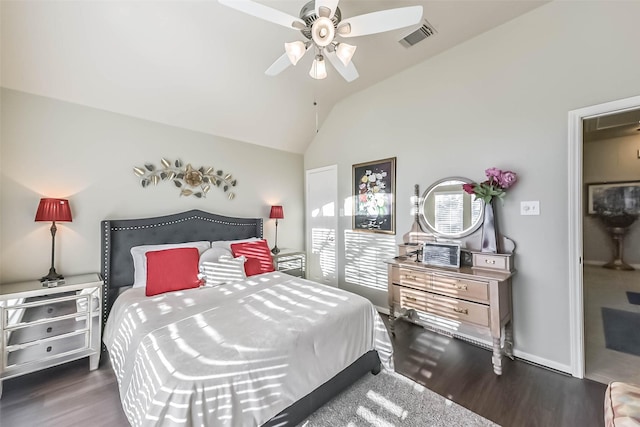 bedroom with visible vents, dark wood finished floors, baseboards, lofted ceiling, and ceiling fan