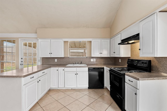 kitchen with black appliances, under cabinet range hood, a sink, a peninsula, and white cabinets