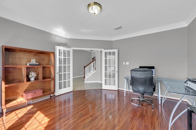 office area with wood finished floors, visible vents, baseboards, french doors, and crown molding