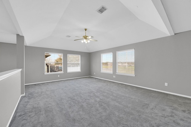 unfurnished room featuring visible vents, baseboards, a ceiling fan, and vaulted ceiling