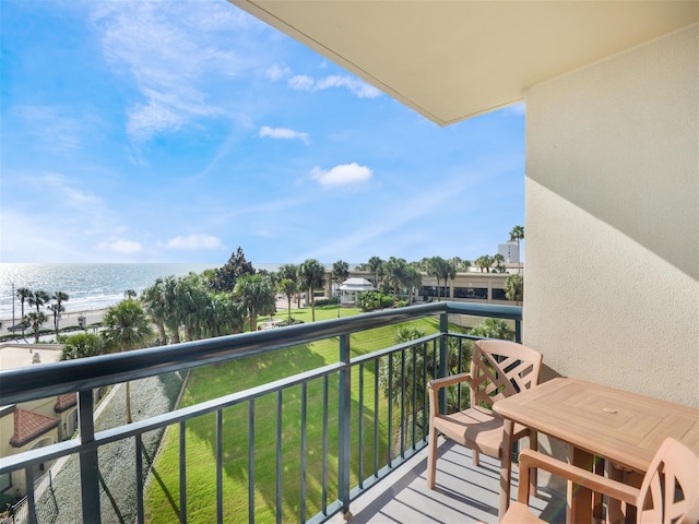 balcony featuring a water view