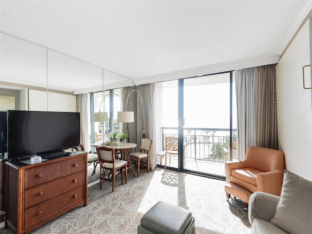 interior space with floor to ceiling windows and ornamental molding