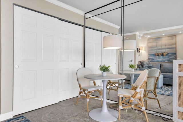 5220 Seawall Blvd Unit 537A, Galveston, TX 77551 - dining area featuring crown molding and concrete floors