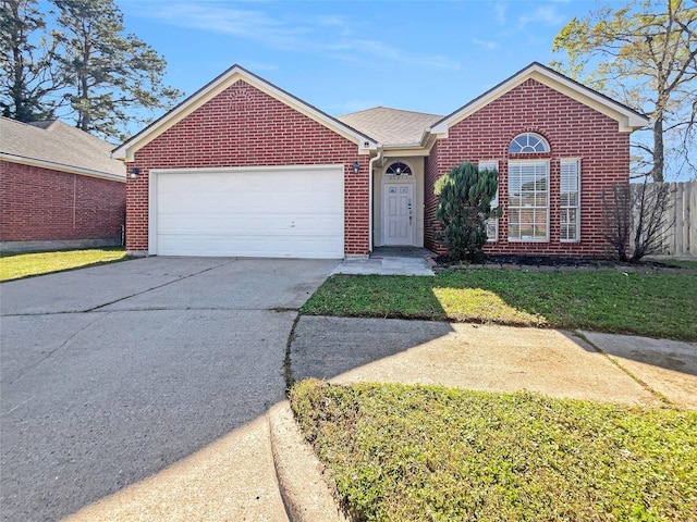 ranch-style house with a front lawn, driveway, fence, an attached garage, and brick siding