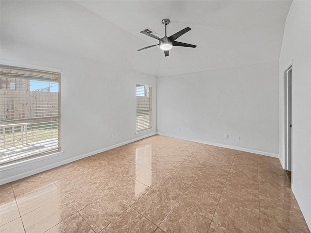 unfurnished room with visible vents, baseboards, and a ceiling fan